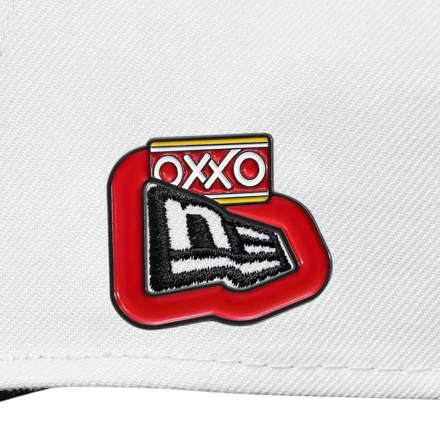 Pin metรกlico โOXXOโ